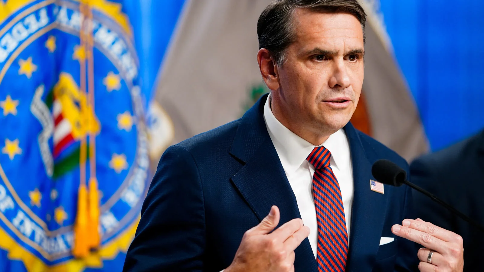 DOJ widens denaturalization push, targeting 12 naturalized citizens