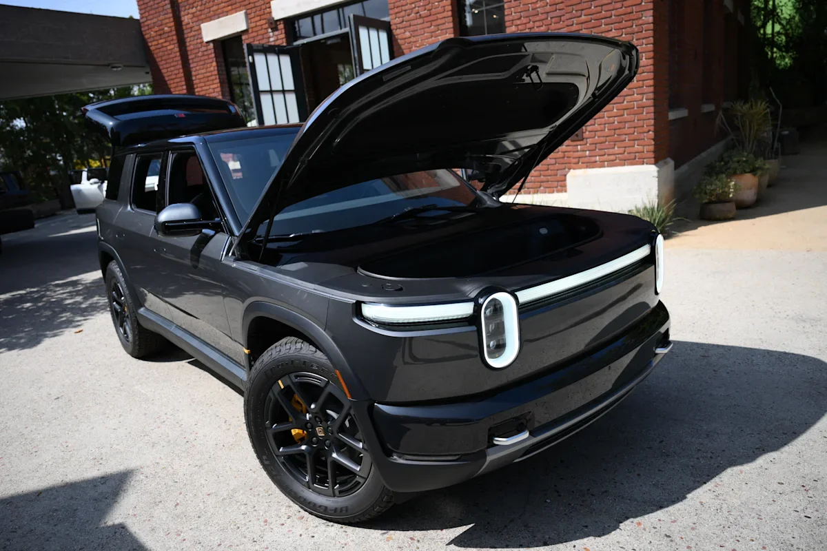 Rivian to raise up to $1.7B via 75-million-share offering as Q2 revenue pre-announced