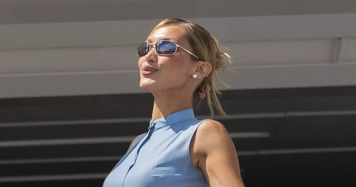 Bella Hadid Lands in Cannes in Baby-Blue Prada, Sneakers in Tow