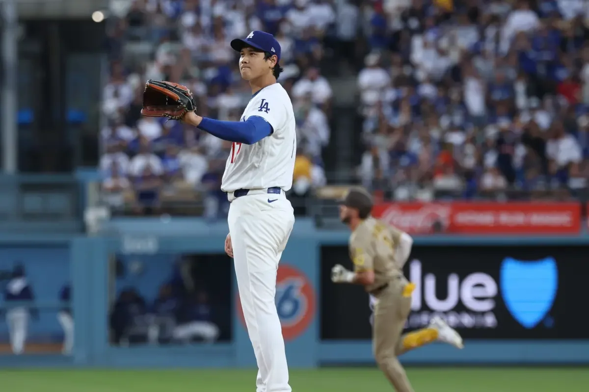 Dodgers rally as Ohtani exits with biceps tightness in comeback win