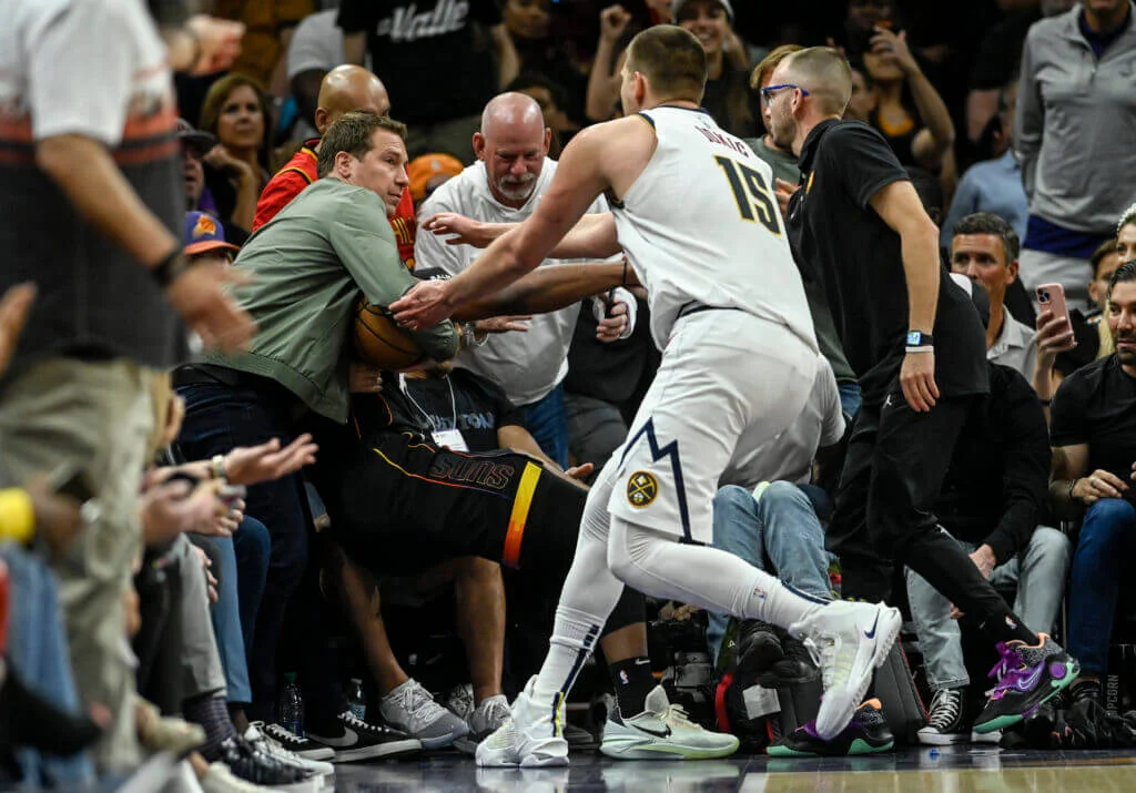 "Nikola Jokić's Controversial Run-In with Suns Owner Sparks NBA Suspension Speculation"