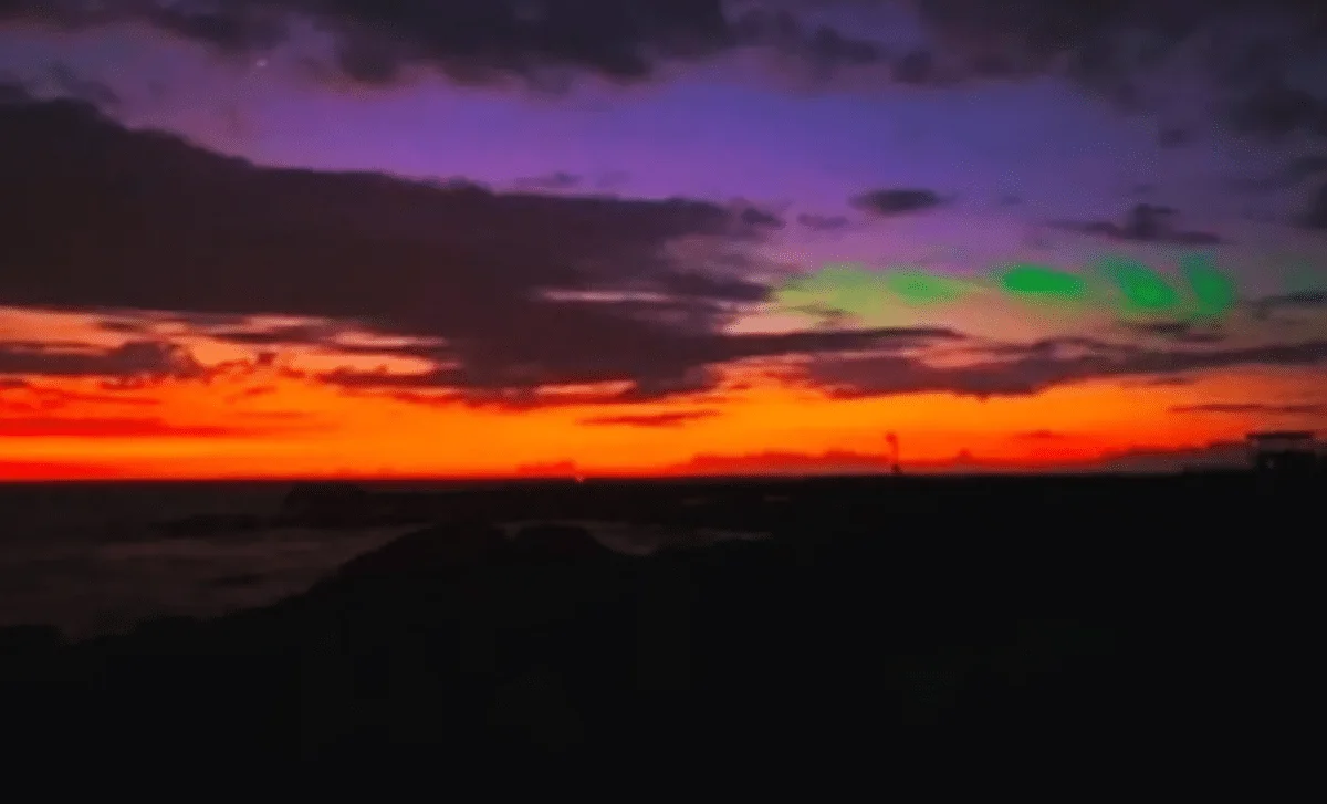 Hawaii's Emerald Sunset: Airglow and Gravity Waves Explain the Green Sky