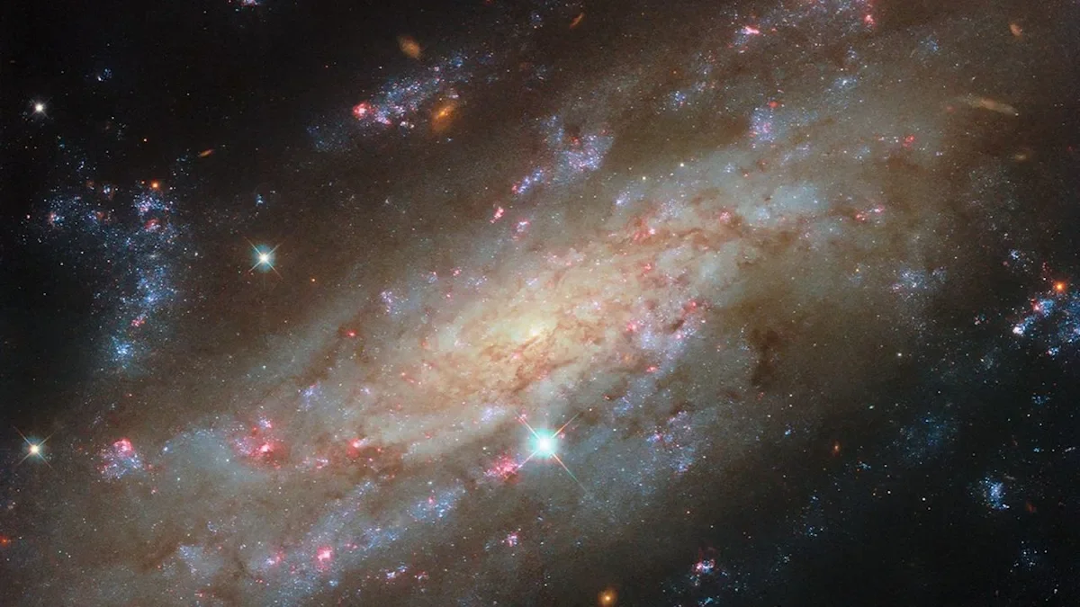 Hubble captures glittering star nurseries in a nearby spiral galaxy