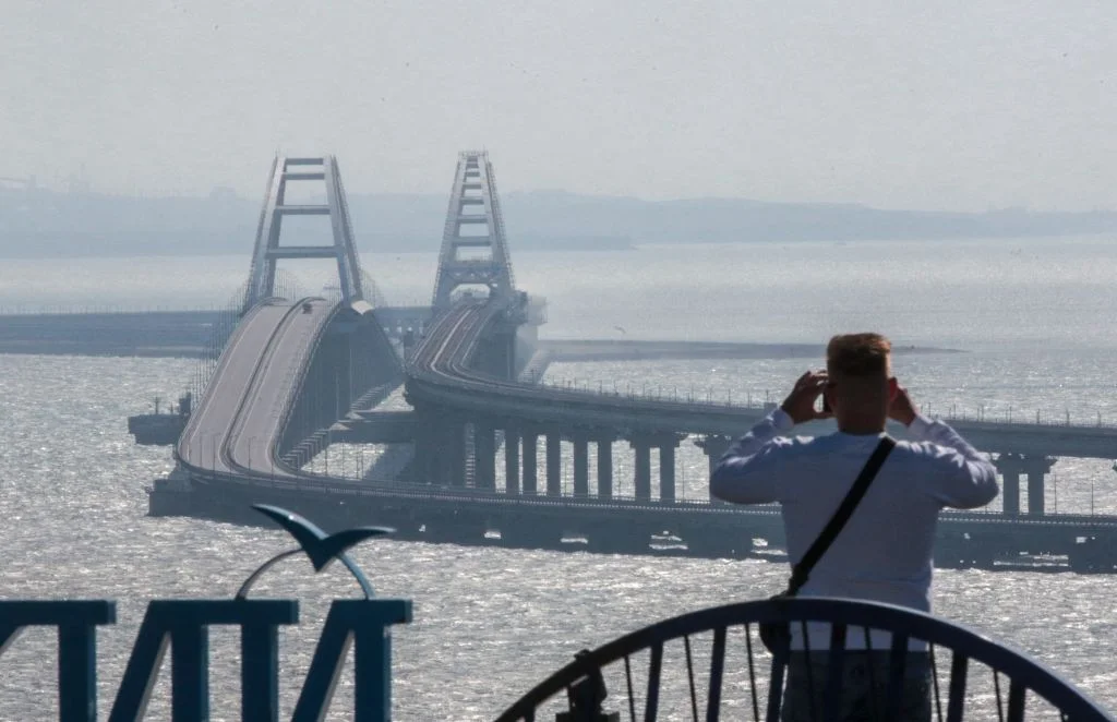 "Russia and Ukraine Clash: Missiles Downed and Hits Reported in Crimea"