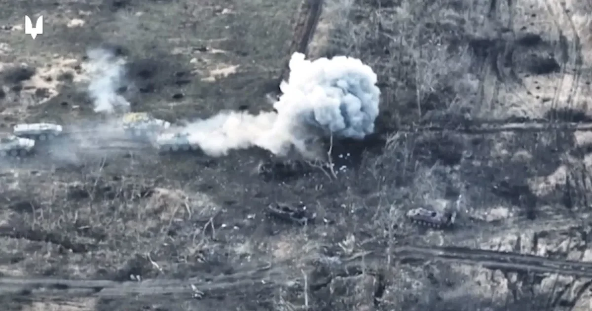 Ukrainian Military's Successful Attack on Russian Vehicles Caught on Video