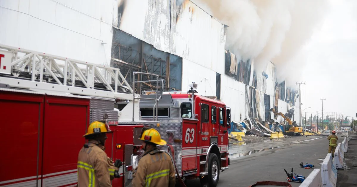 Boyle Heights blaze drags on, spurring school relocations and air-quality warnings