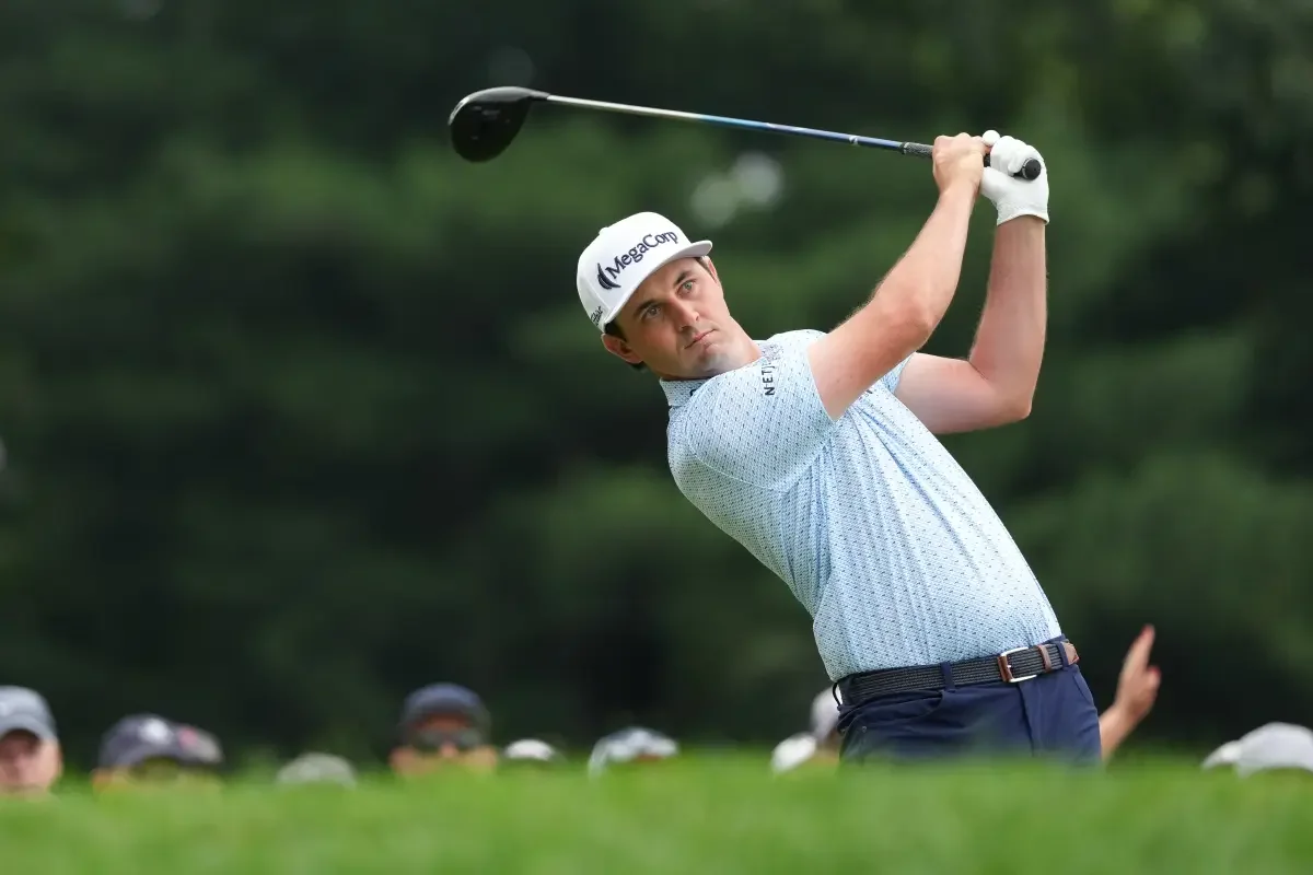 Poston's 12 on a Par-5 derails Travelers round