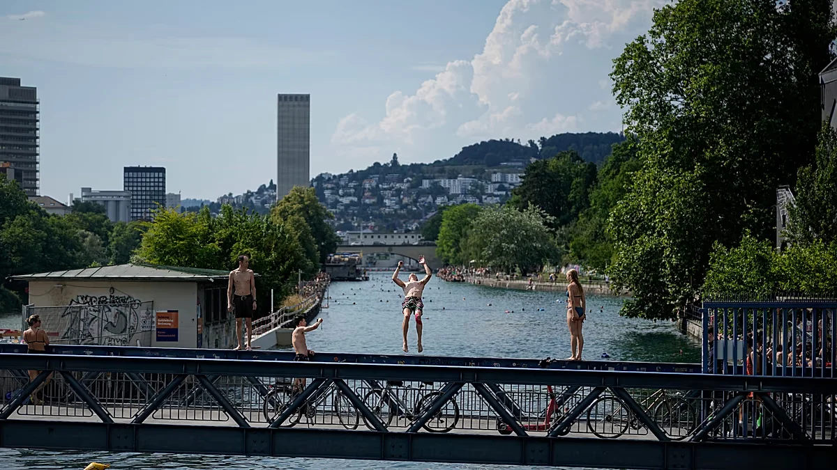 Solstice heatwave grips Europe as France restricts alcohol at Paris festival