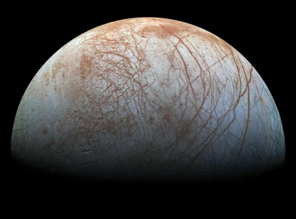 Europa's Hidden Ocean Could Surpass Earth's Seas, Kept Liquid by Jupiter's Tides