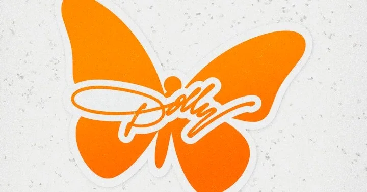 Volunteers pay tribute to Dolly Parton with 2026 helmet stickers