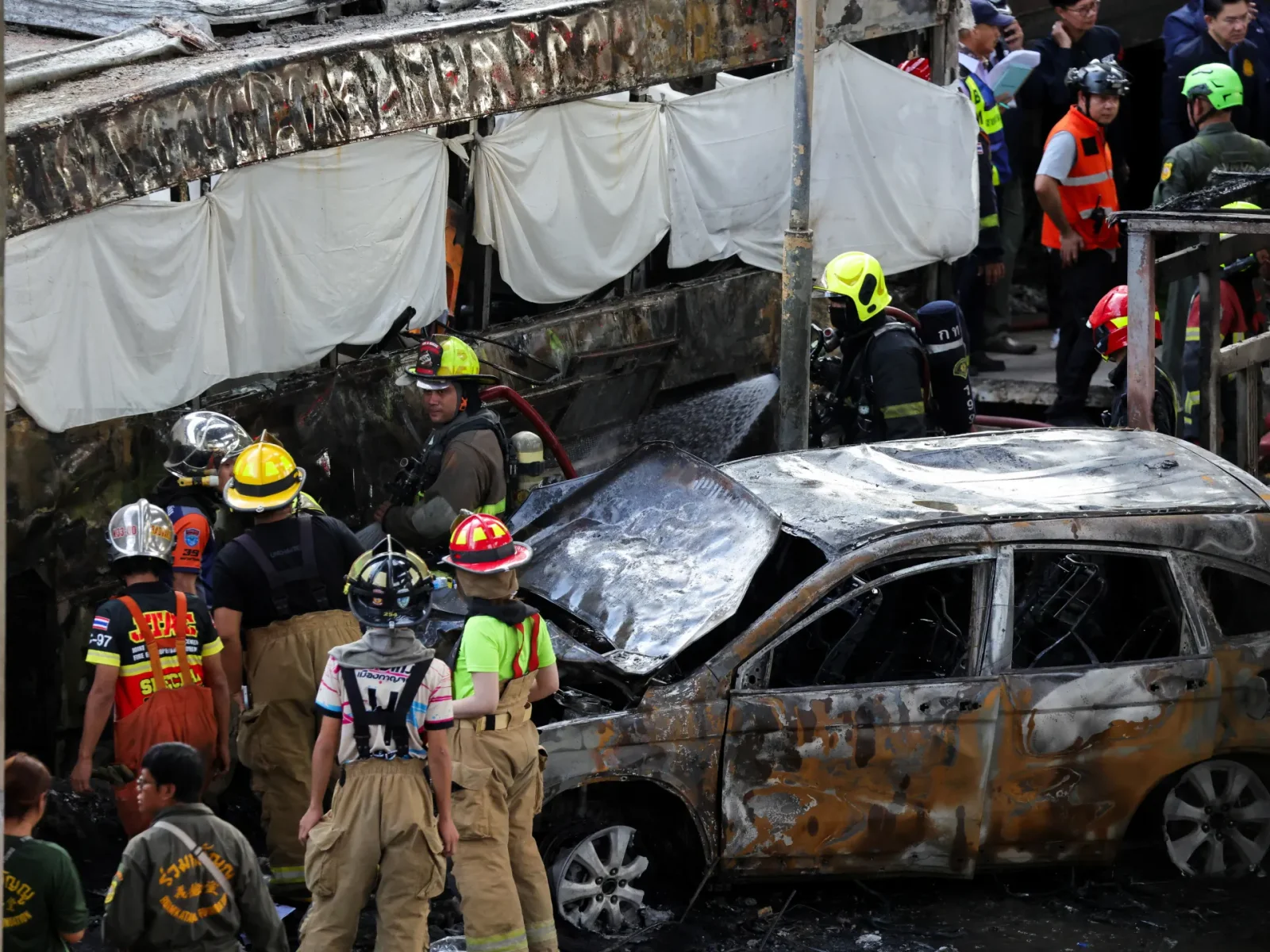 Bangkok Freight Train Hits Bus, Killing at Least Eight and Wounding Dozens