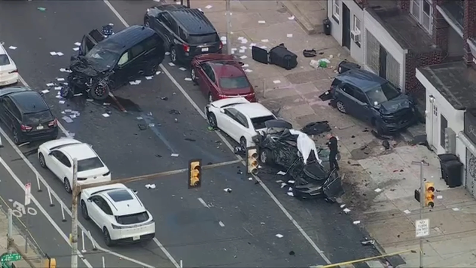 Speeding SUV runs red light in West Philadelphia, killing a person and a dog