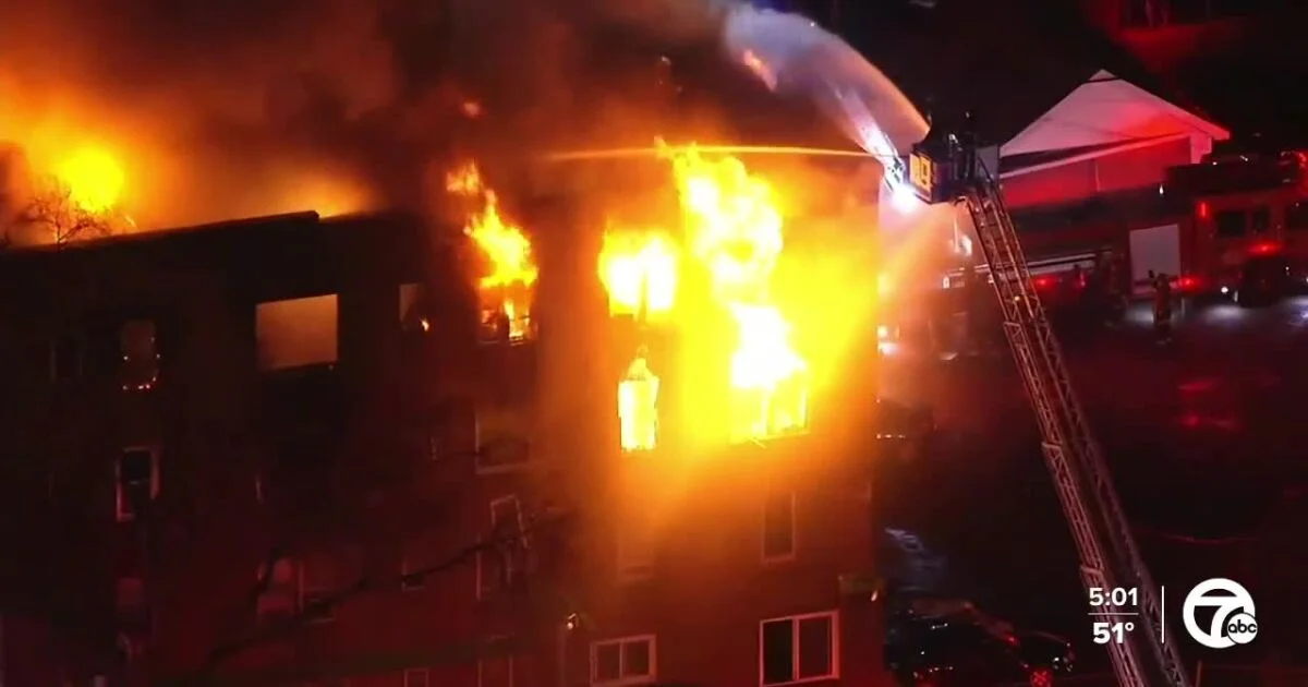 Possible arson attack on Detroit apartment building leaves dozens injured and displaced.
