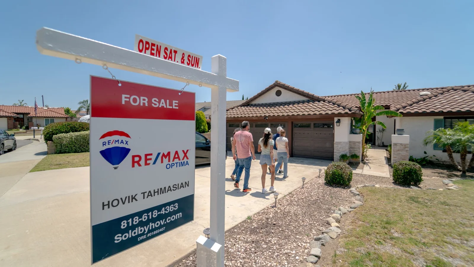 May housing surge lifts existing-home sales to December-high pace