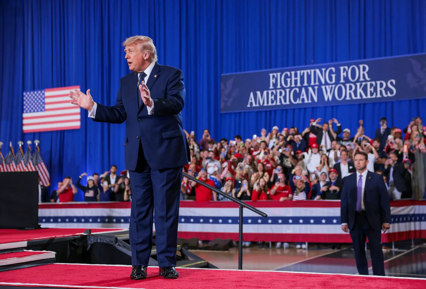 Trump stitches tax cuts to culture-war themes in New York rally