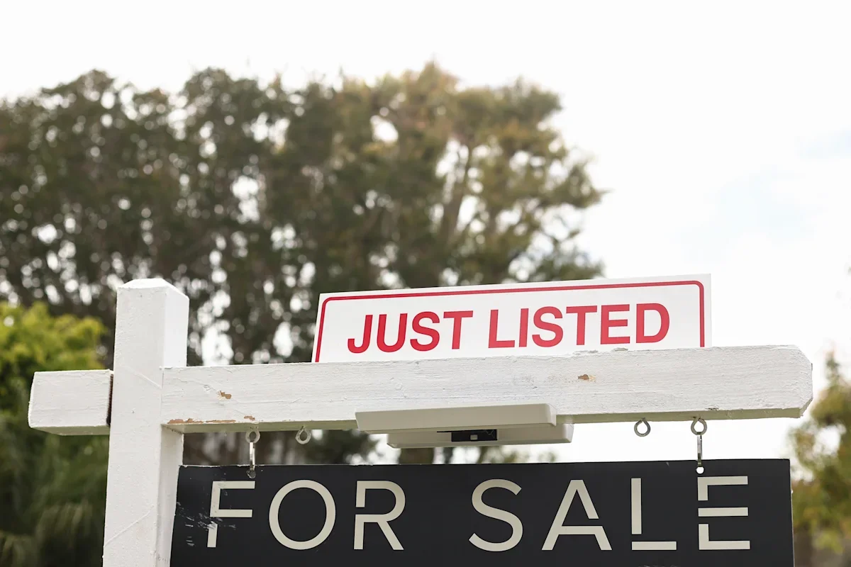 July housing cools as mortgage costs pressure buyers