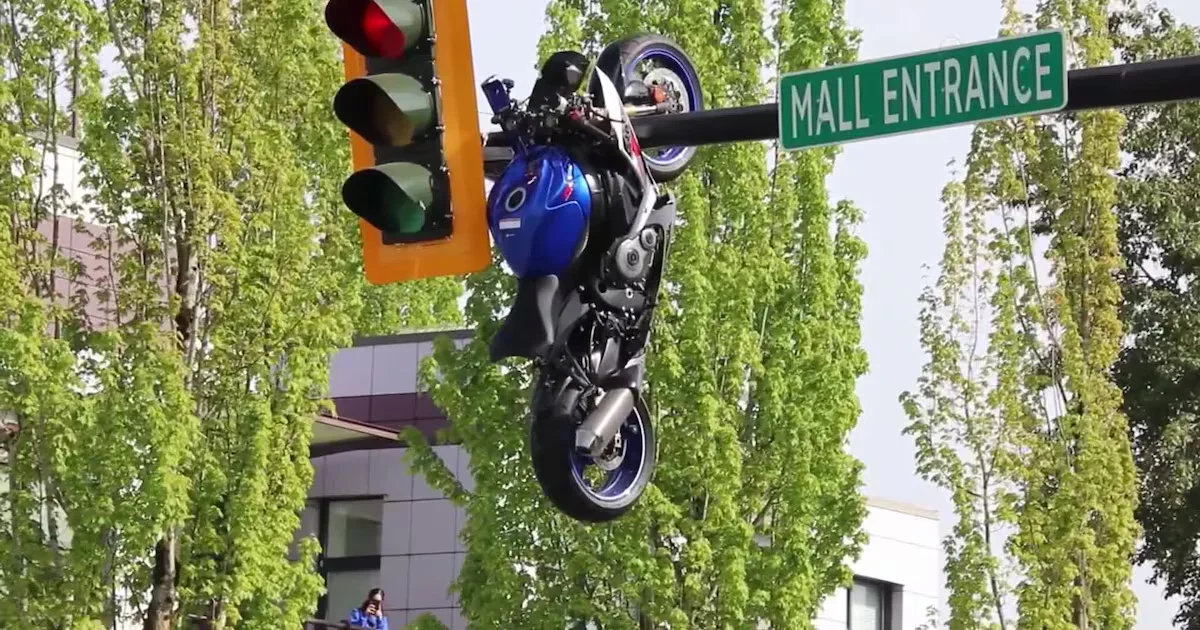 Motorcycle Suspended From Vancouver Traffic Light After Crash