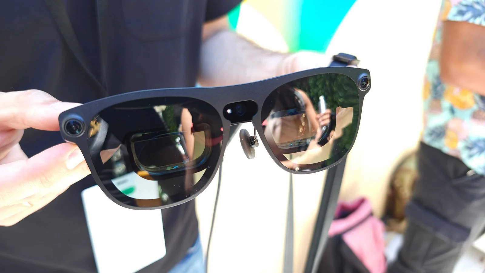 Xreal Aura fuses VR power into smart glasses via a pocket compute puck