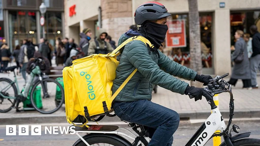 Spain paves way for legal status for about half a million migrants