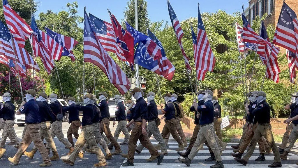 Masked Patriot Front march toward Capitol during July 4 celebrations