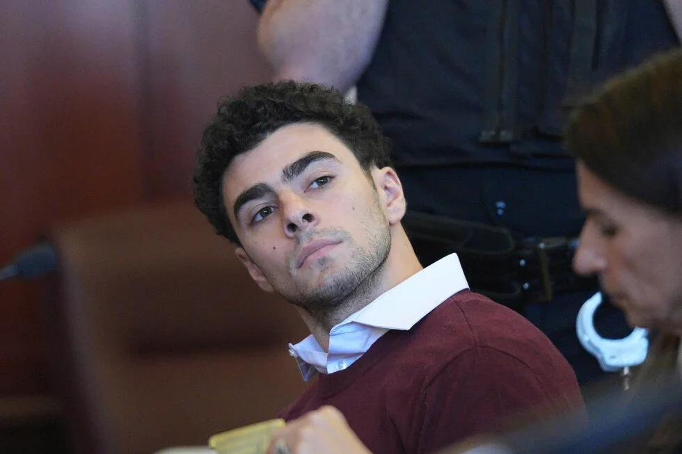 Court OKs gun and notebook for Mangione murder case