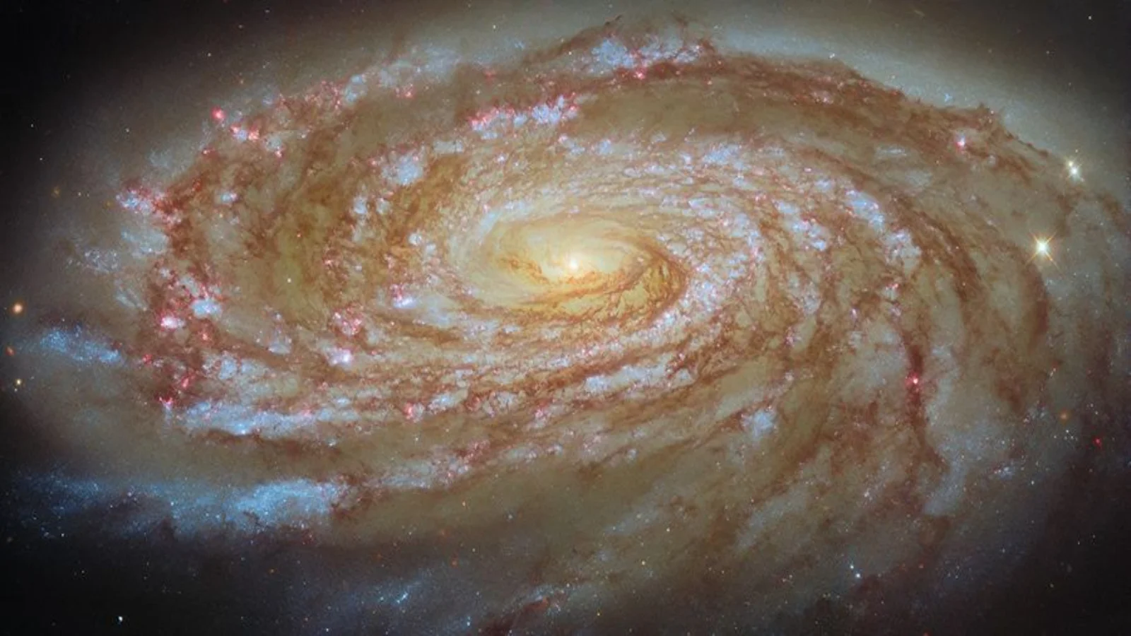 Hubble Captures Mesmerizing Spiral Galaxy M88 in Virgo Cluster