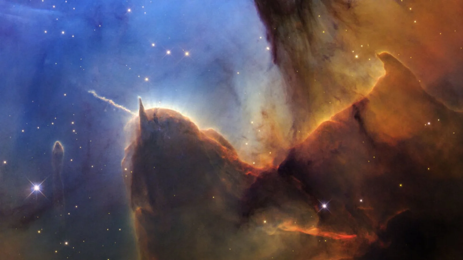 Hubble spots an expanding newborn jet in the Trifid Nebula on its 36th anniversary