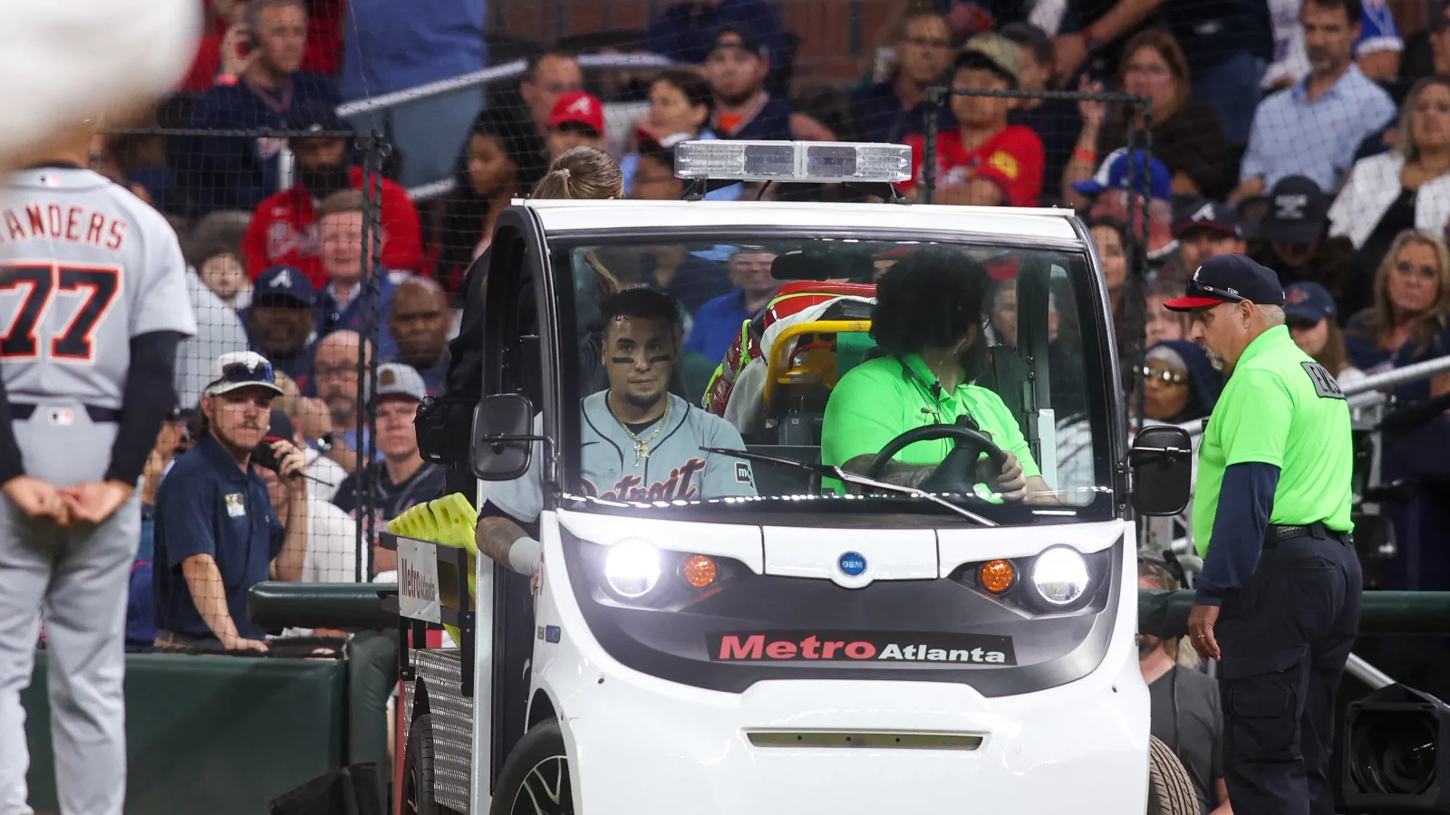 Baez carted off after awkward first-base slide vs. Braves