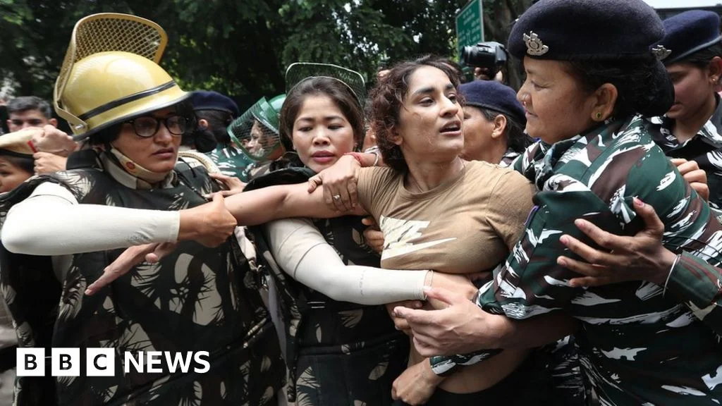 Indian Olympic wrestlers detained during protest crackdown.