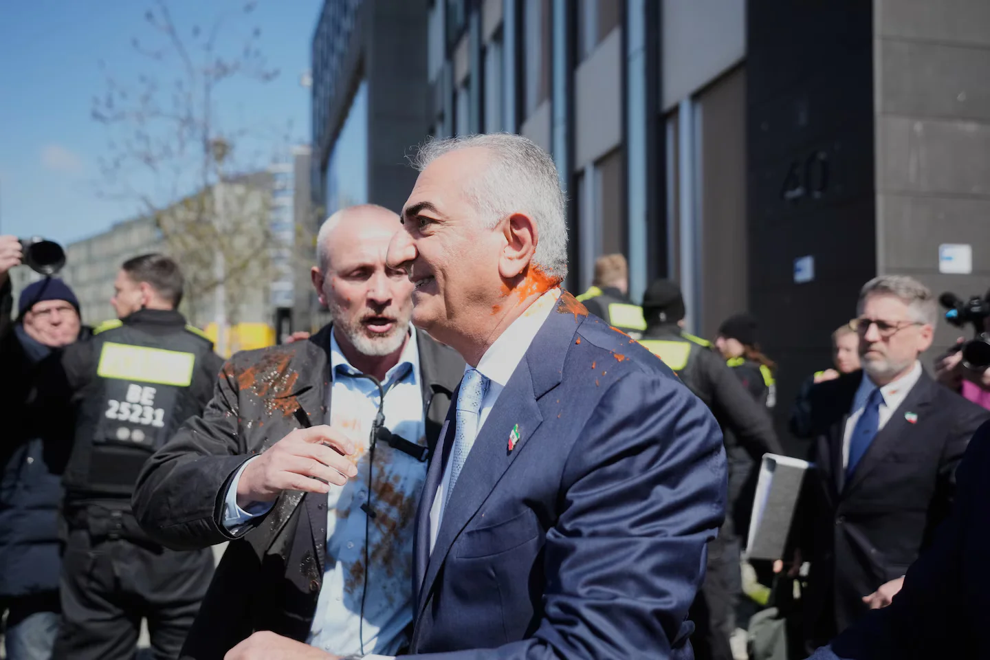 Berlin incident: Iran’s exiled crown prince Reza Pahlavi splattered with red liquid after news briefing