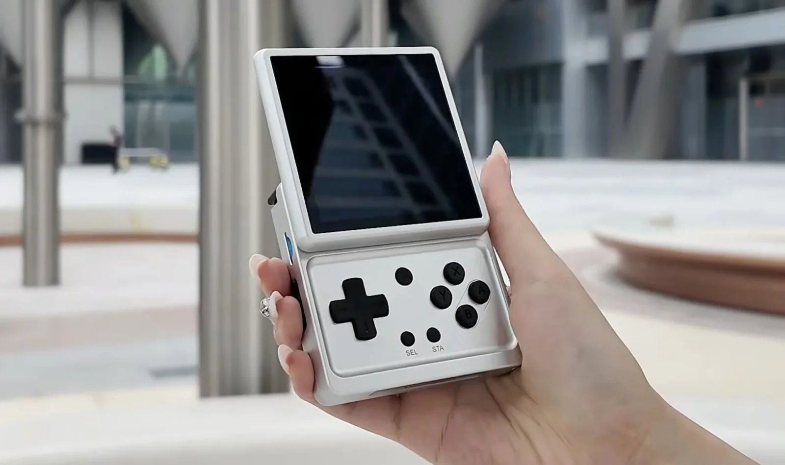 Anbernic’s RG Rotate Brings 2000s Phone Flair to a Rotating-Display Handheld
