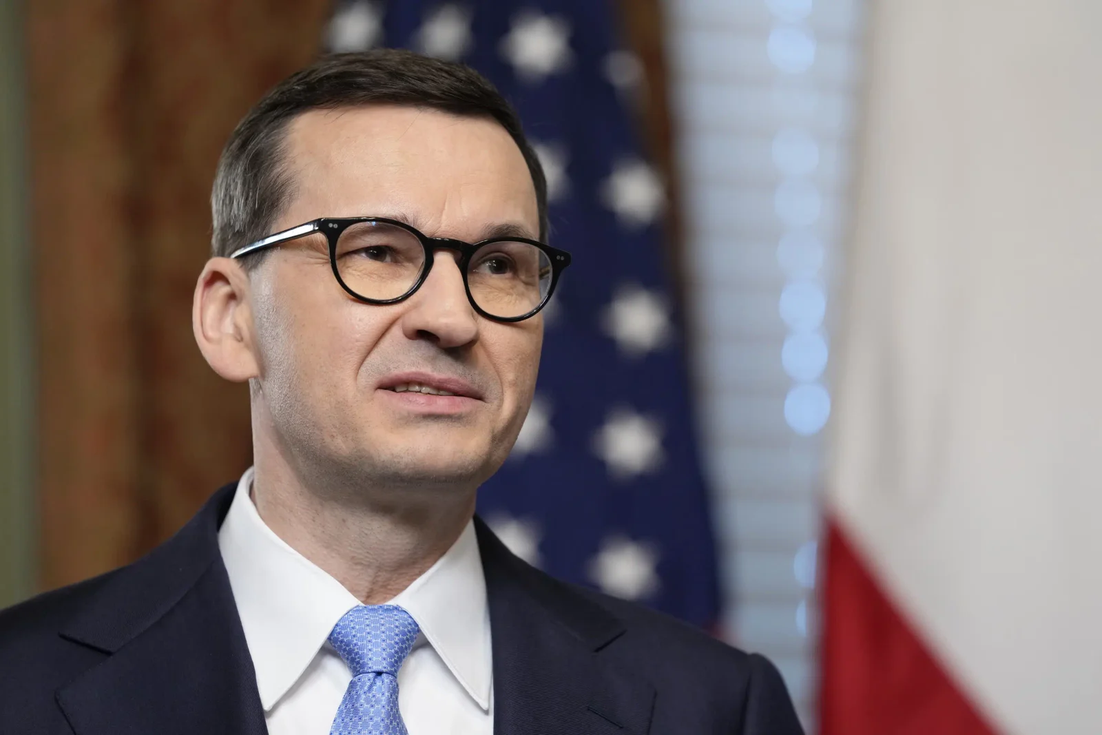 Polish ruling party proposes commission to probe Russian influence, critics cry foul.
