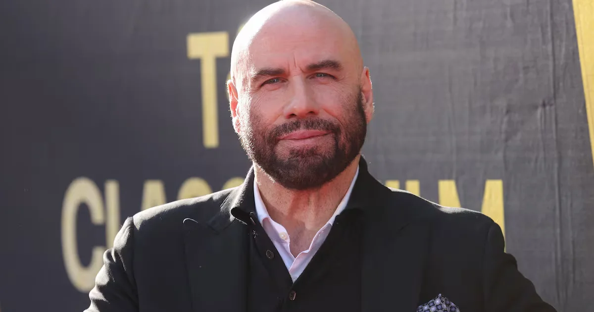Travolta's Cannes Beret Sparks Facelift Theories