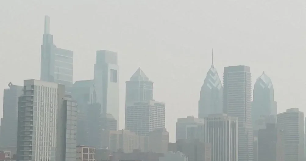 Philadelphia's Air Quality Reaches Dangerous Levels Amidst Wildfire Smoke and Climate Change Concerns.