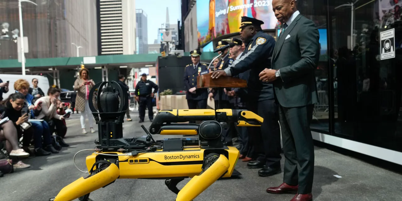 NYPD introduces high-tech robotic dogs and snitchBOT for city safety.