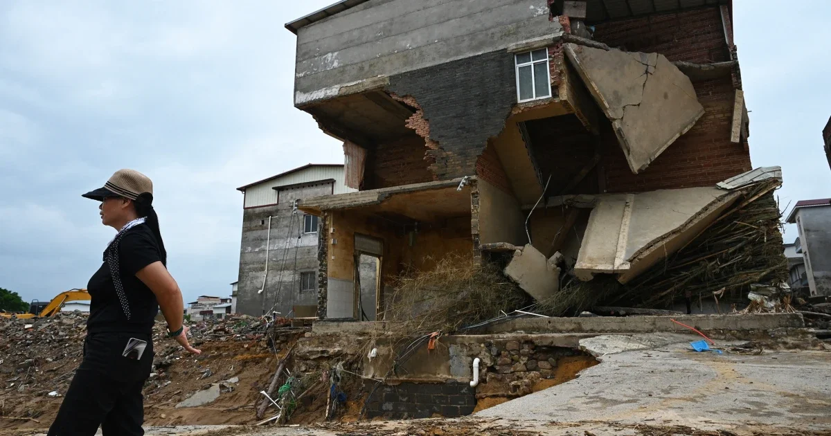 Deadly floods sweep southern China as dam breachs unleash chaos and snakes