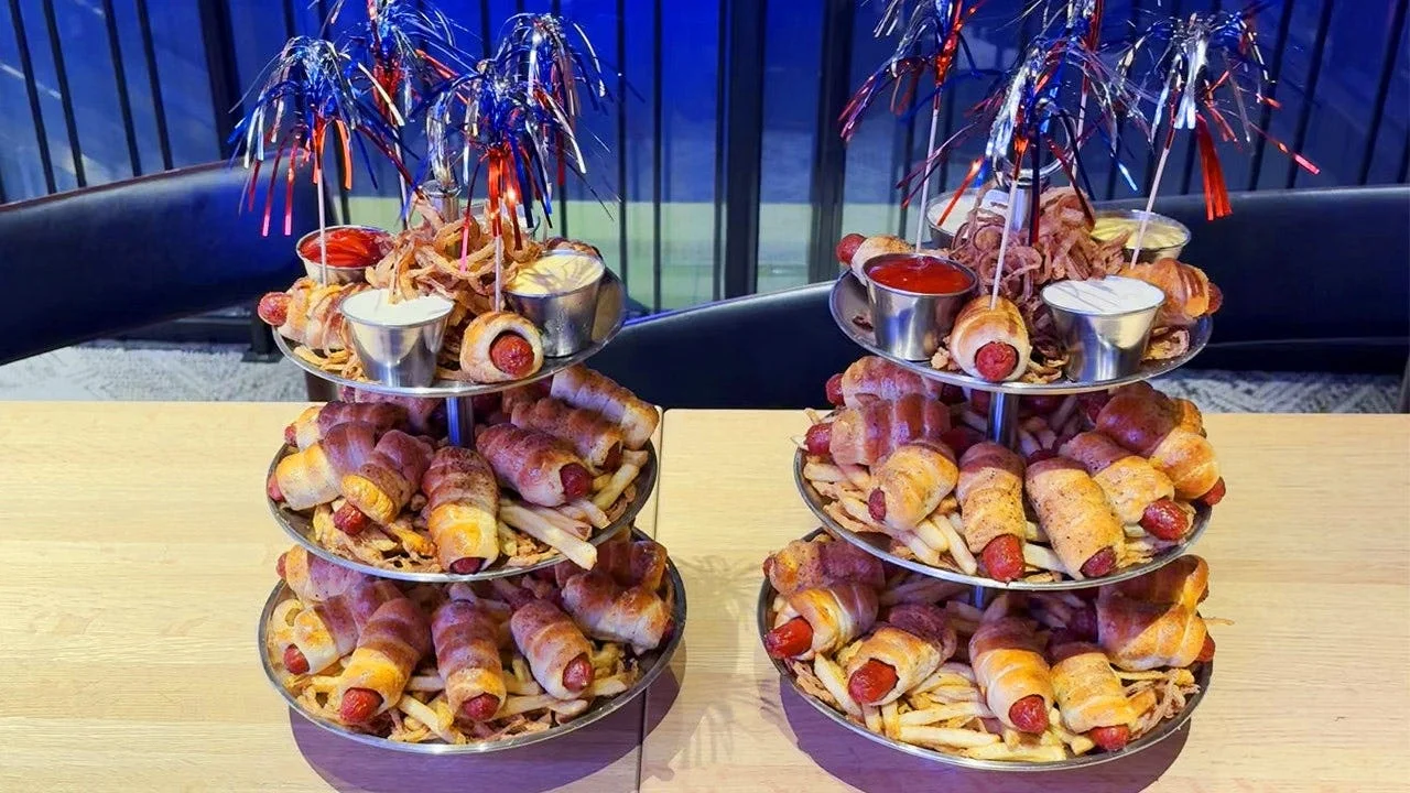 Towering Pretzel Dog Tower Lights Up Dave & Buster's Fourth of July in Times Square