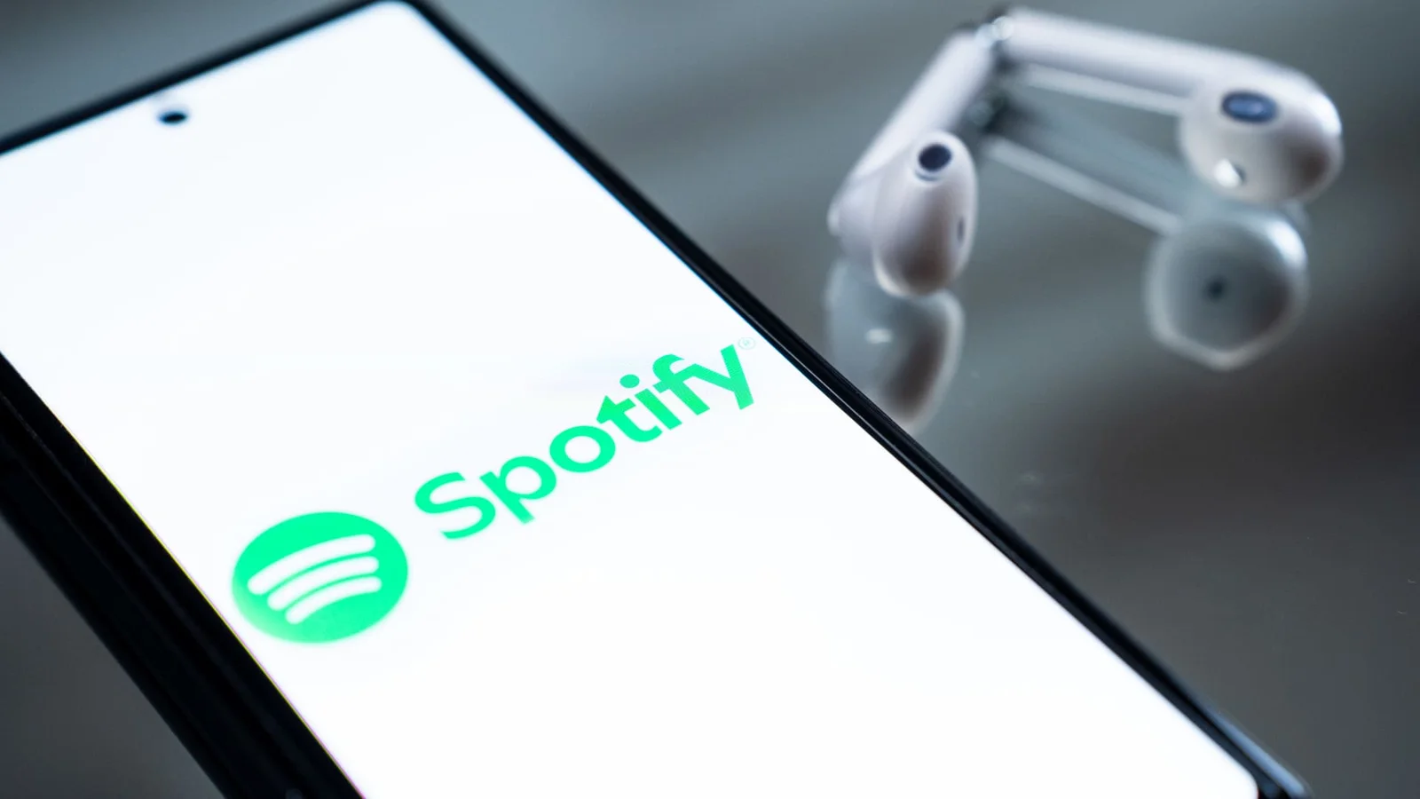 Spotify slips after muted outlook despite earnings beat