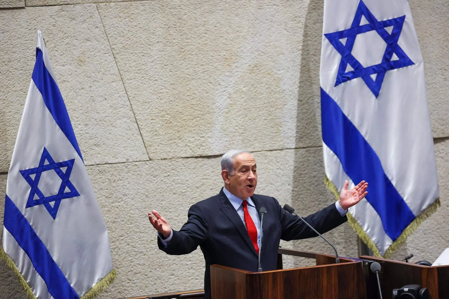 Netanyahu secures passage of controversial Israeli budget.