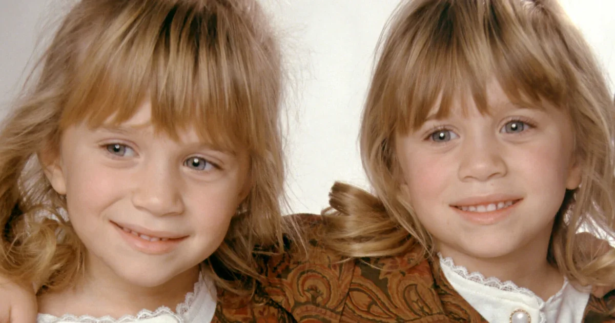 Olsen siblings reunite at Trent's wedding in rare family portrait