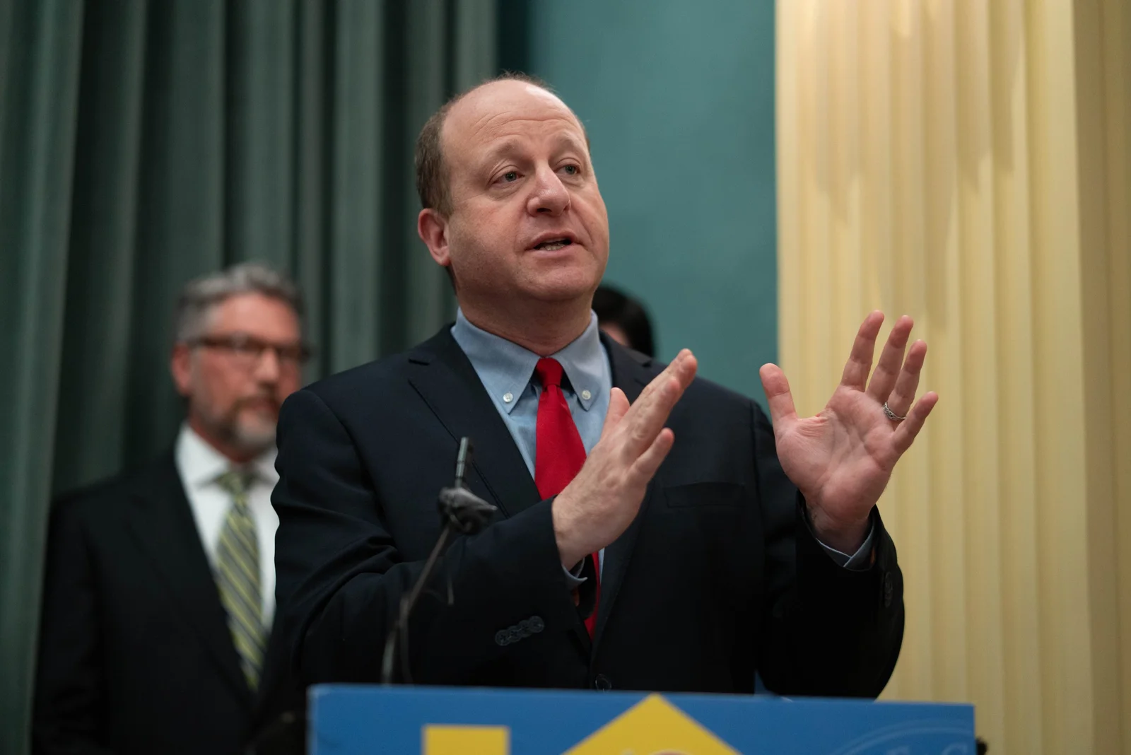 Polis defends reduced Peters sentence amid bipartisan backlash