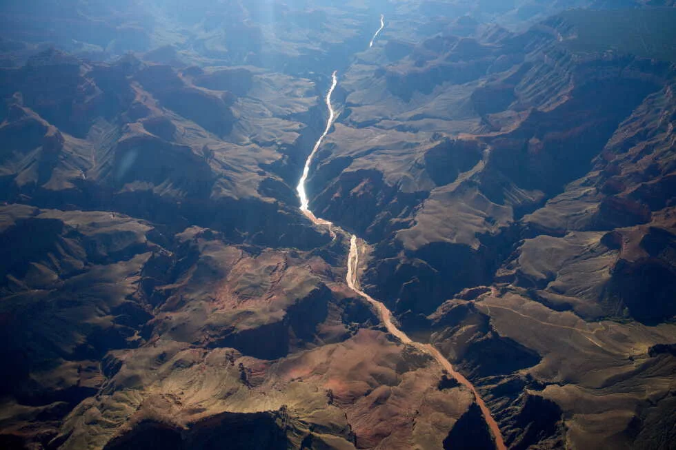 Grand Canyon floods slice into water lifeline, rattling local economy