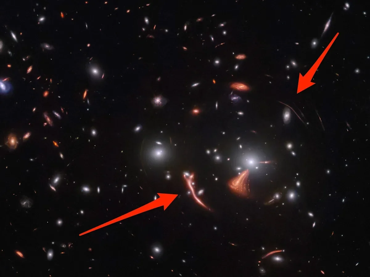 "James Webb telescope captures trippy spacetime warp in distant galaxy cluster"