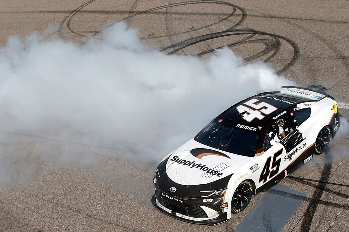 Reddick seals dramatic last-lap overtime win at Kansas
