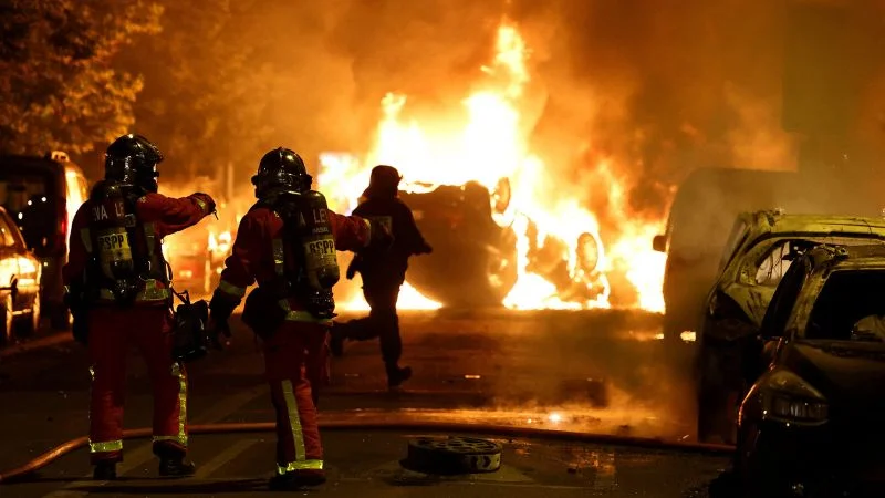 "France's Unrest Escalates: Funeral Sparks Protests and Riots"