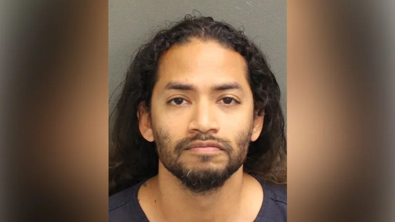 Arrest made in 'ambush' killing of Florida Microsoft exec with ties to ex-wife's husband.