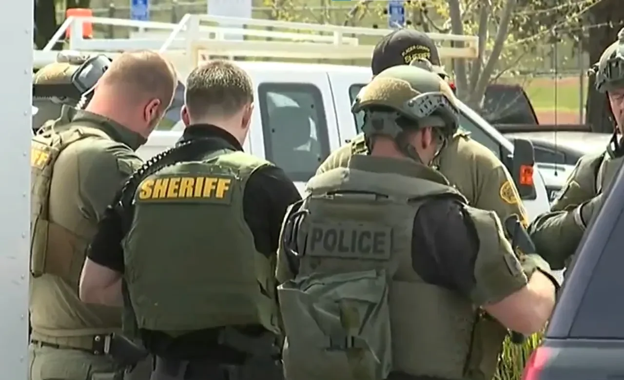 Hostage killed and officer wounded in California park shooting
