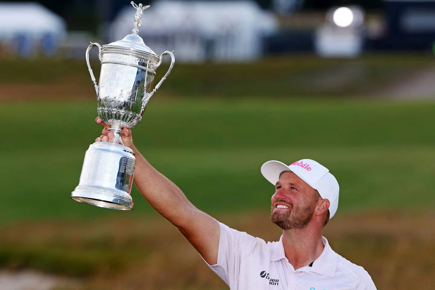 Clark defies a hostile crowd to win a second U.S. Open
