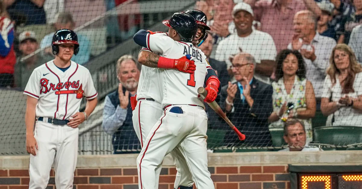 Braves Rally to Beat Mets in Rain-Delayed Game.