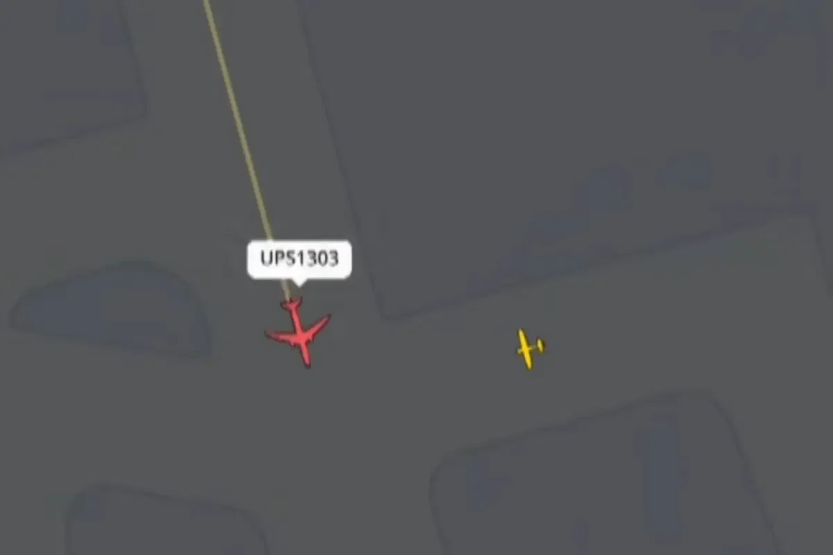 UPS jet narrowly avoids collision at Louisville airport as controller shouts 'What are you doing?'